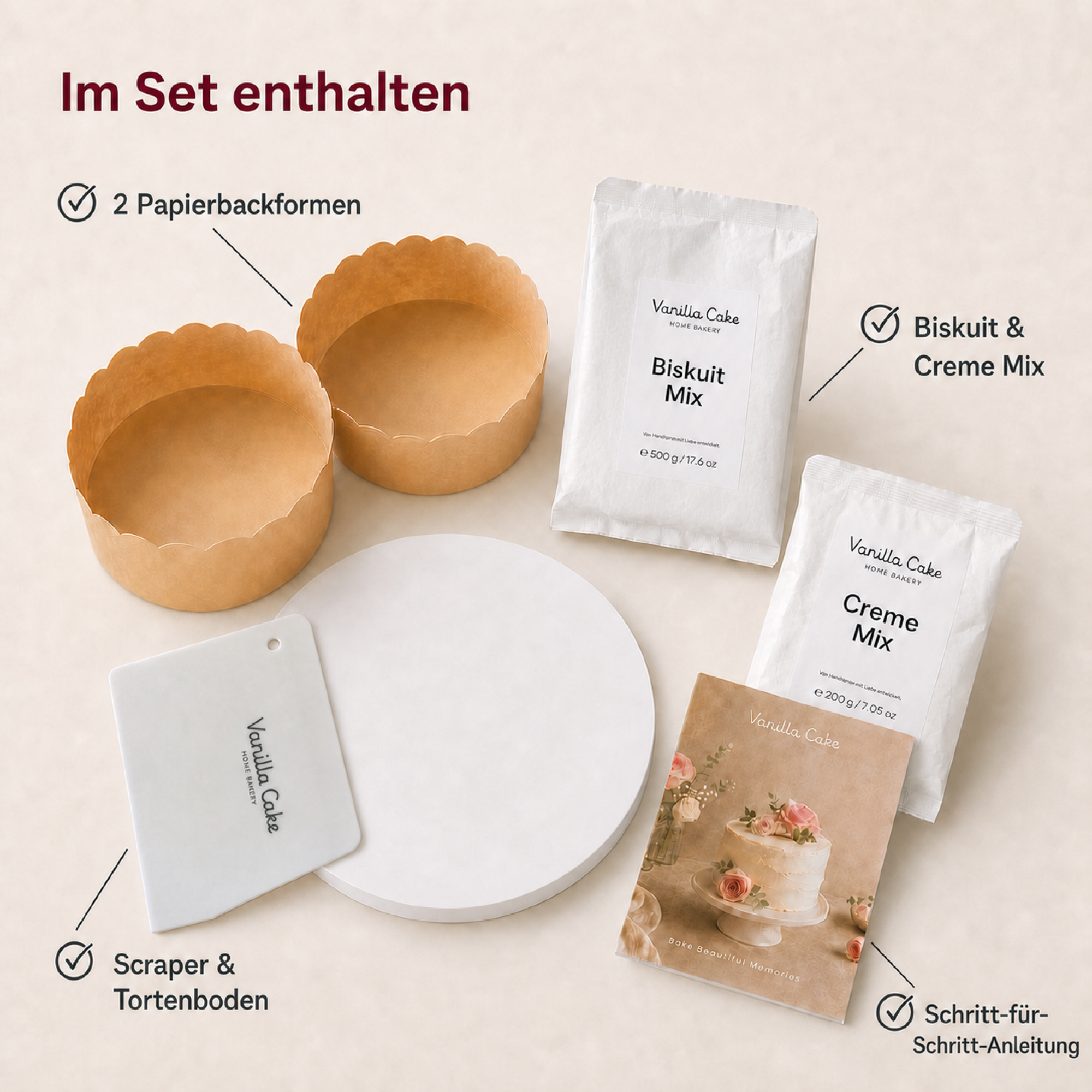 Inhalt des Vanilla Cake Torten-Backsets mit Biskuit Mix, Creme Mix, zwei Papierbackformen, Scraper, Tortenboden und Schritt-für-Schritt-Anleitung